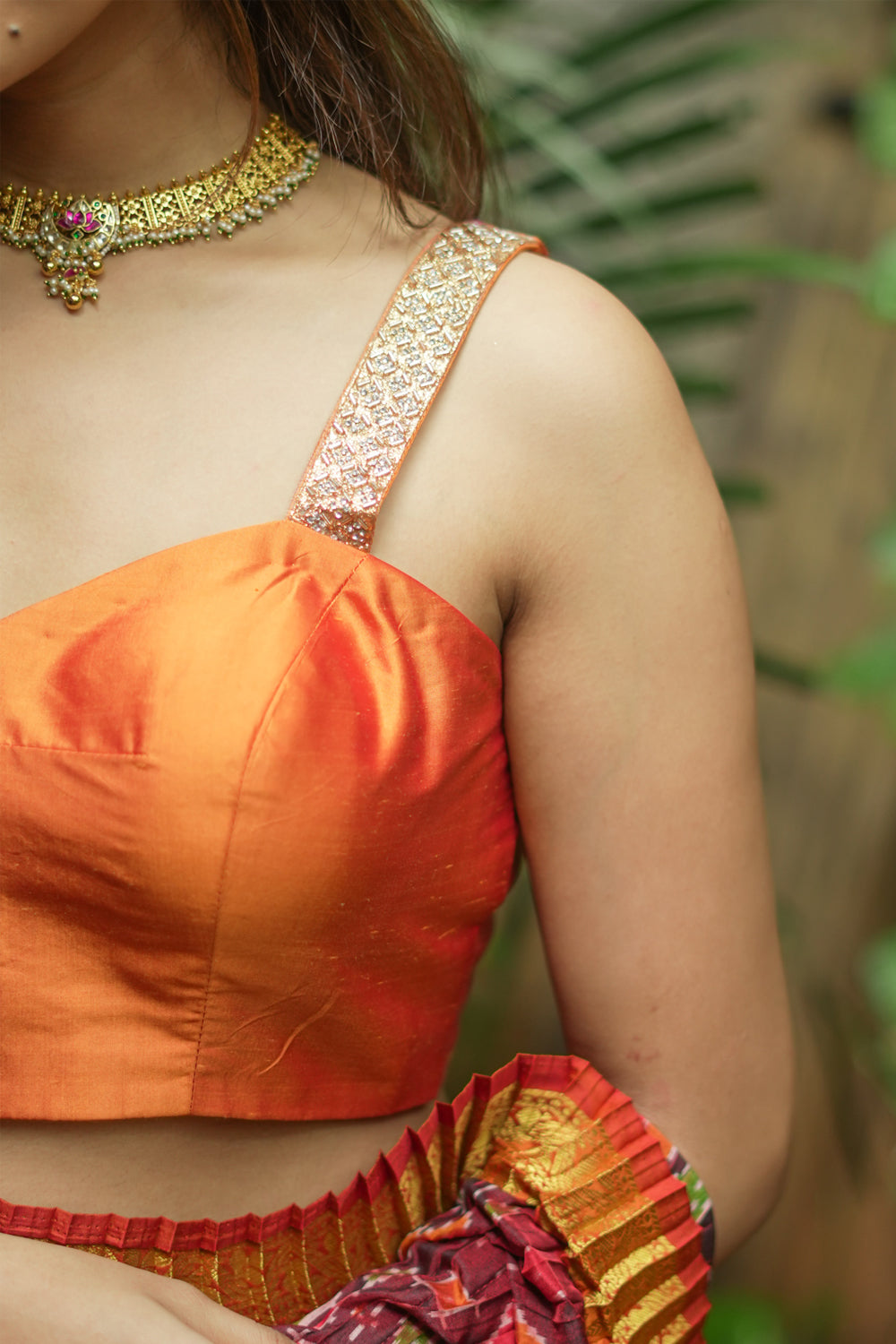 Orange silk sweetheart neck blouse with border detailing