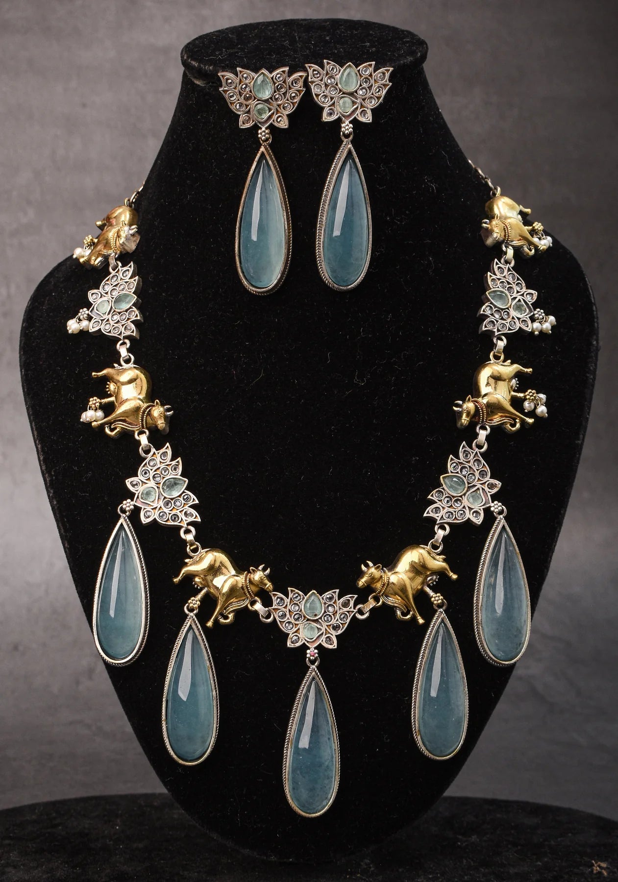 Fusion Dual Tone Jewelry with Pichwai Cow Units and Heather Blue Stones