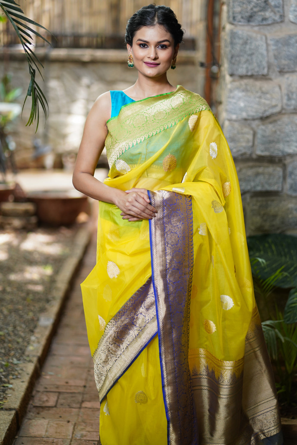 Banarasi Silk Organza Saree in Yellow with Ganga Jamuna Borders