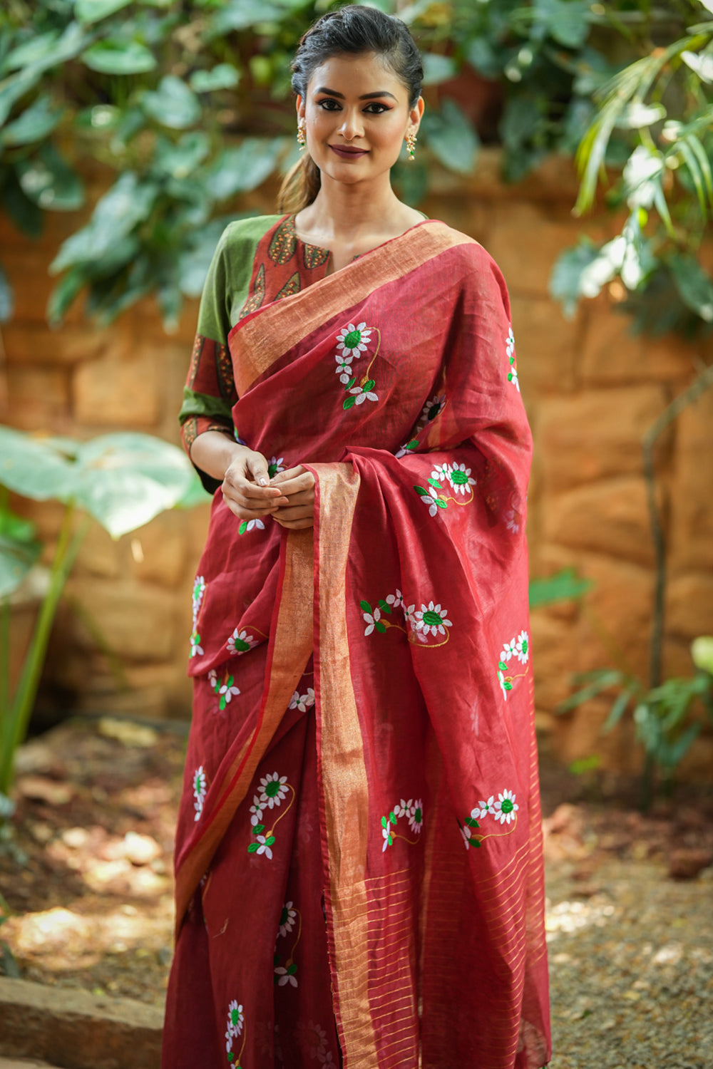 Brick red embroidered  linen saree