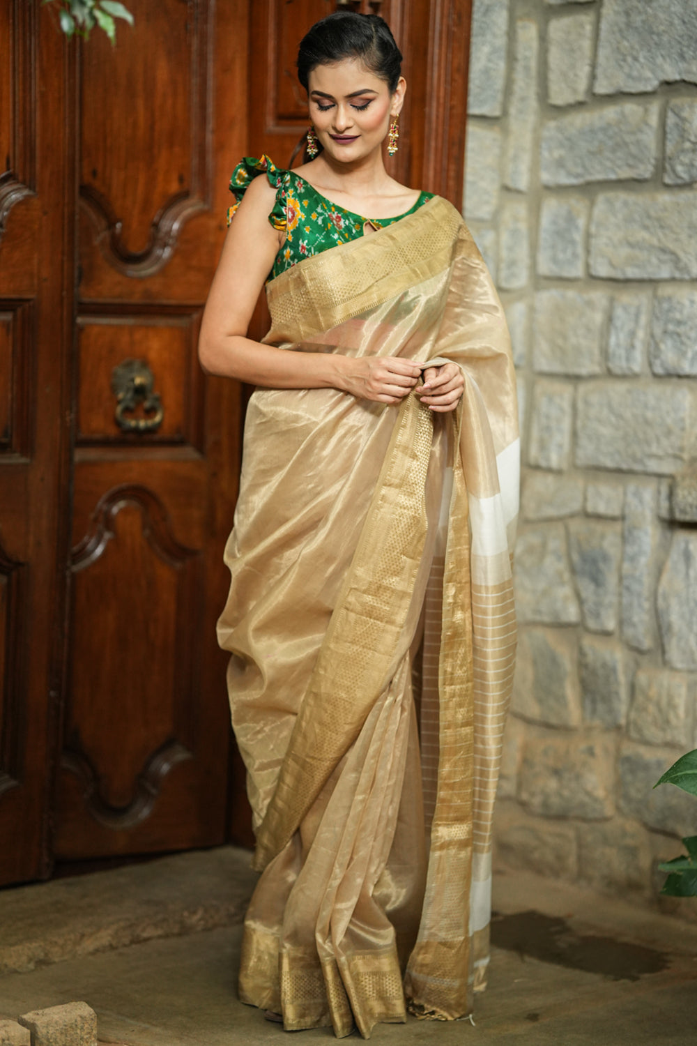 Handwoven maheshwari tissue saree with gold zari border