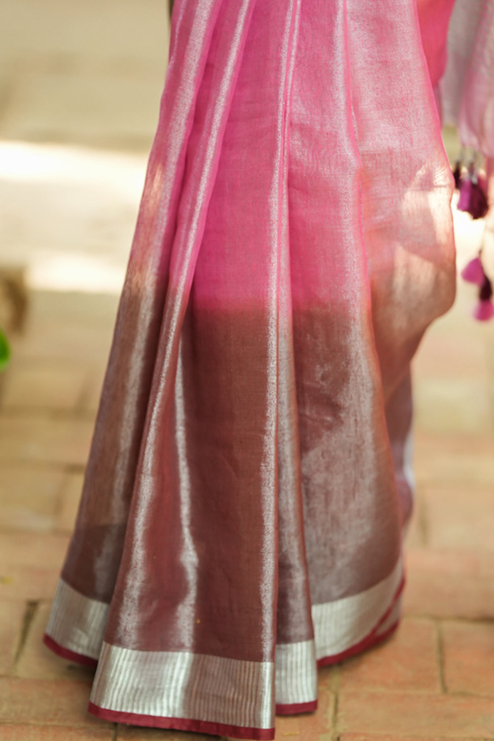 Blush pink and burgundy ombre linen saree with silver  border.