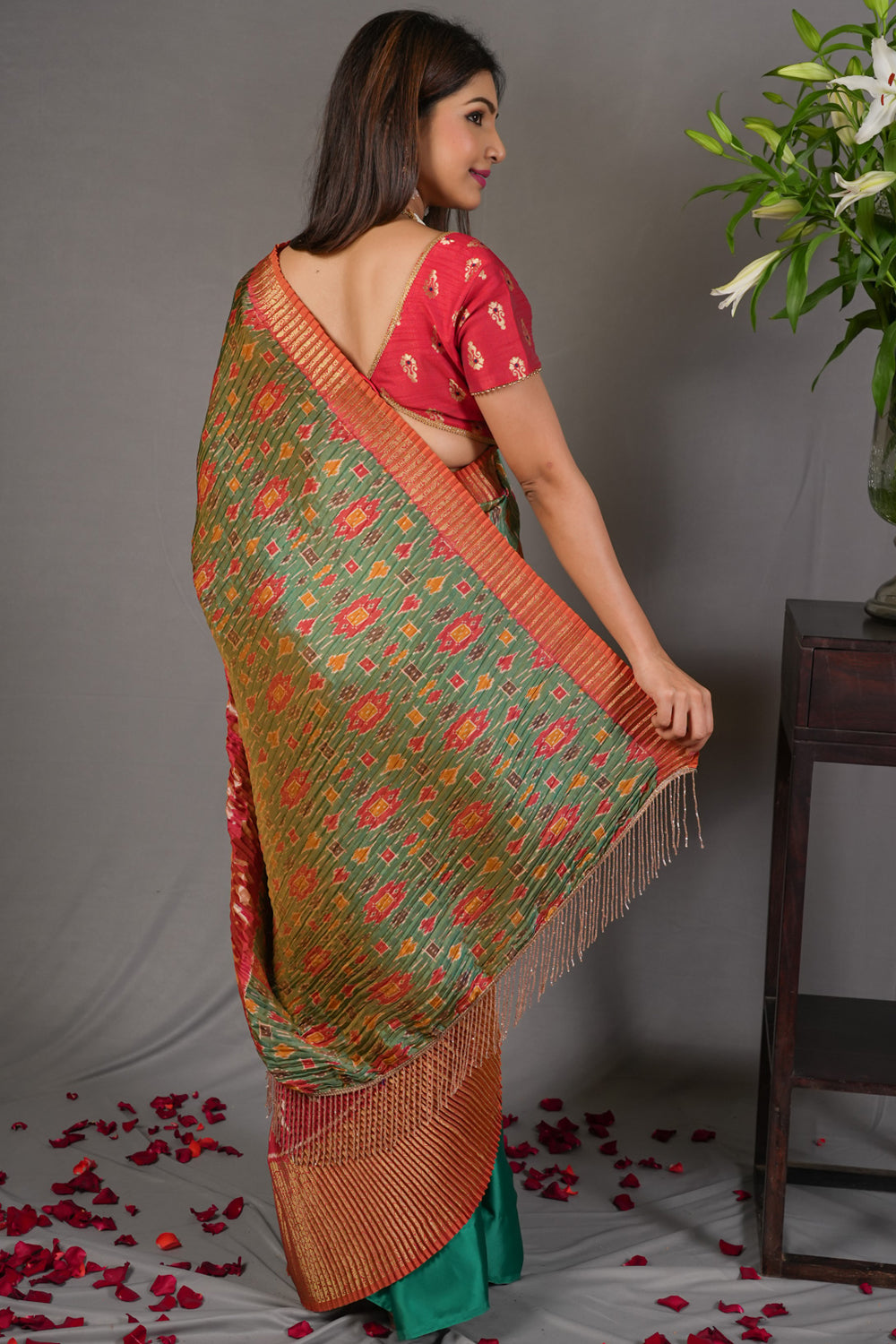Green patola & satin half and half saree with red border