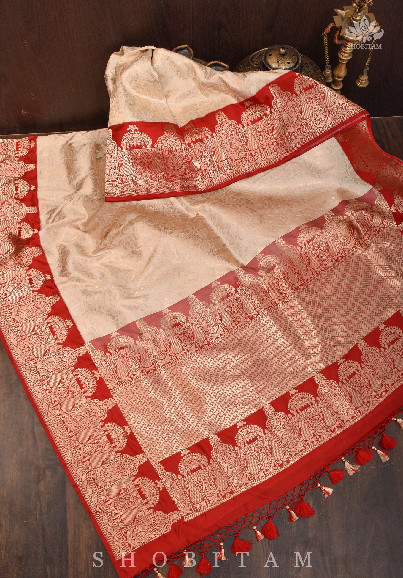 Exquisite Celebrity Brocade Banarasi Pure Katan Silk Saree in Ivory, Red & Gold with Dome Shaped Kadhiyal Borders | SILK MARK CERTIFIED