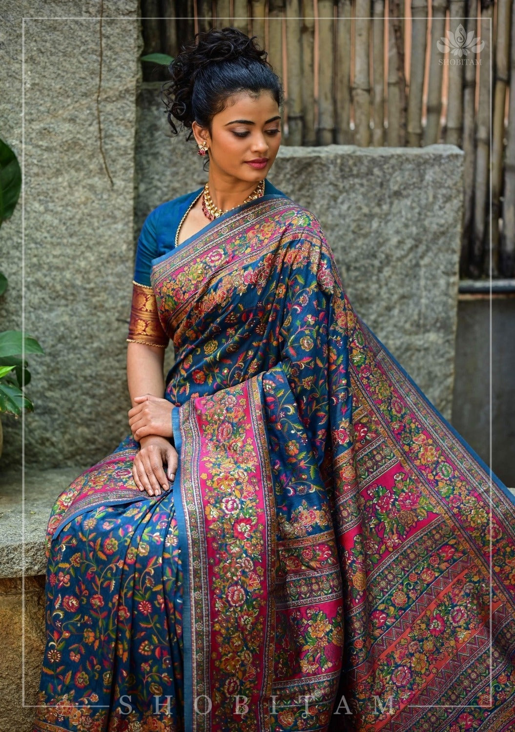 Kani Design with Floral Jaal in Teal and Red Rayon Saree