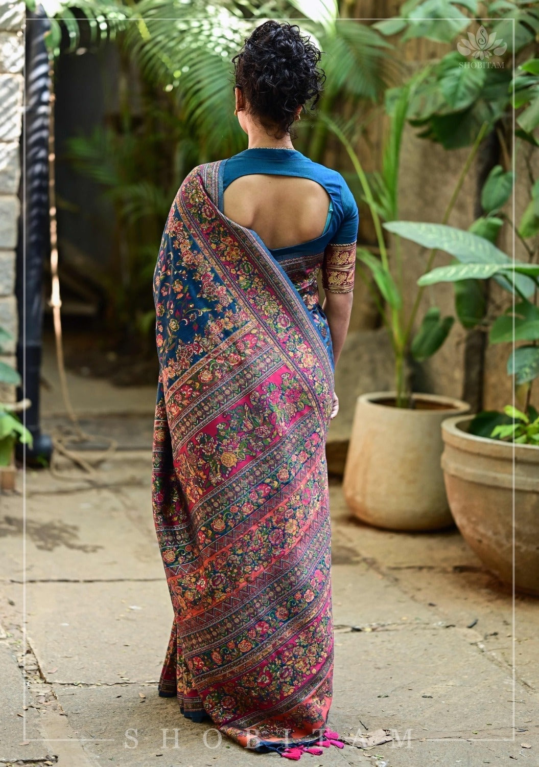 Kani Design with Floral Jaal in Teal and Red Rayon Saree