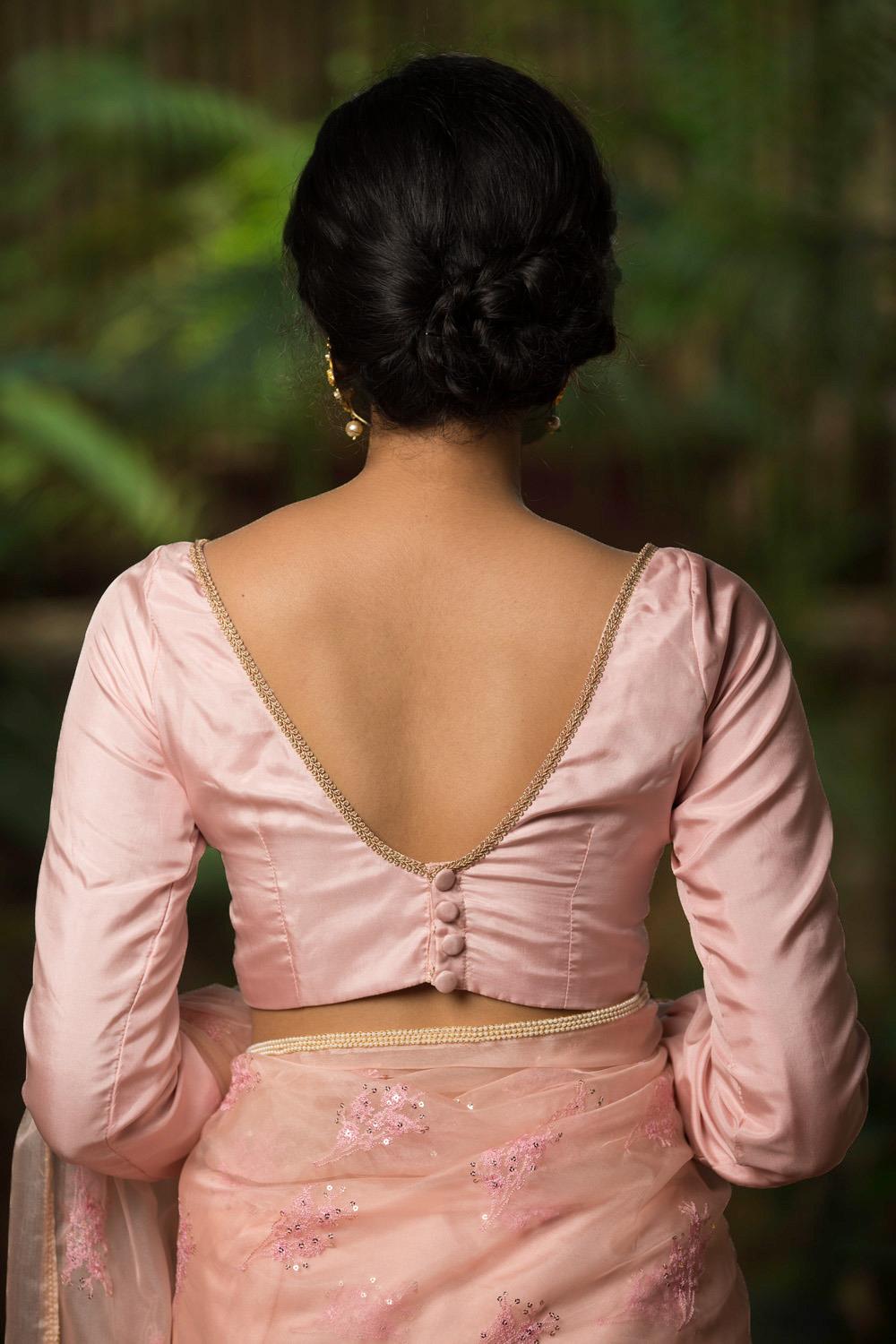 Baby pink silk blouse with gathered sleeves and border detailing