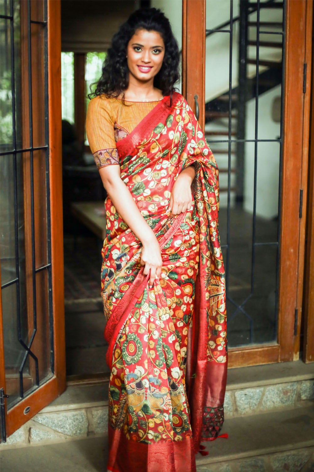 Maroon maheshwari silk kalamkari saree with cutwork pallu and brocade border