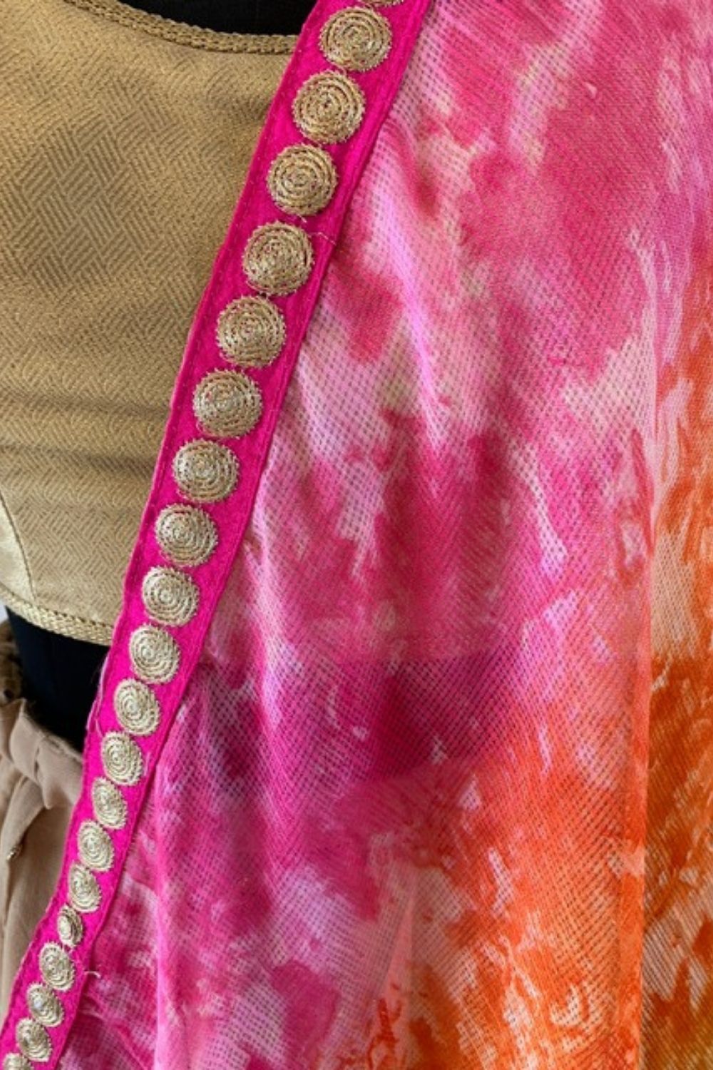 Pink, yellow and orange shibori shaded Kota dupatta with pink and gold border