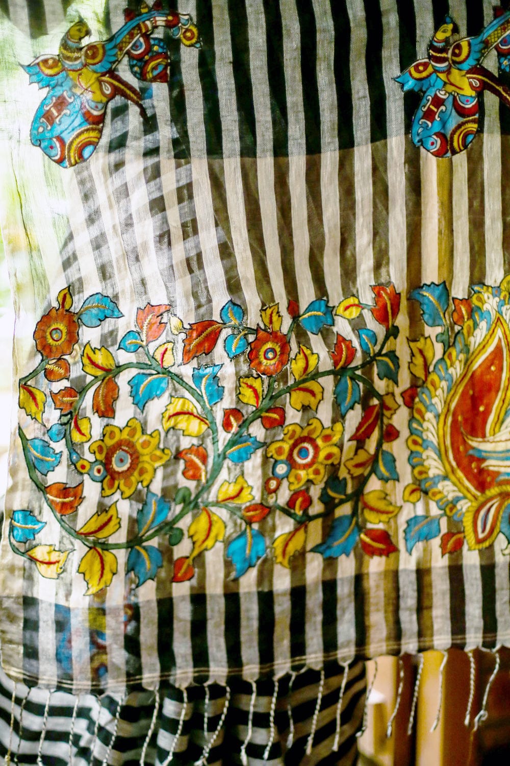 Black and white striped handwoven linen saree with silver tissue border with kalamkari applique