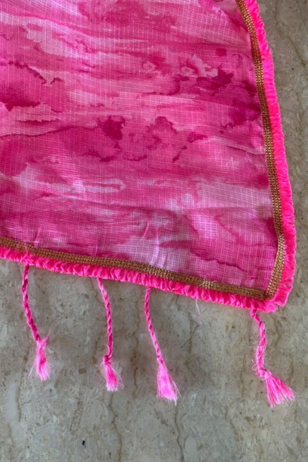 Pink and white shibori shaded Kota dupatta with pink-gold frill edging