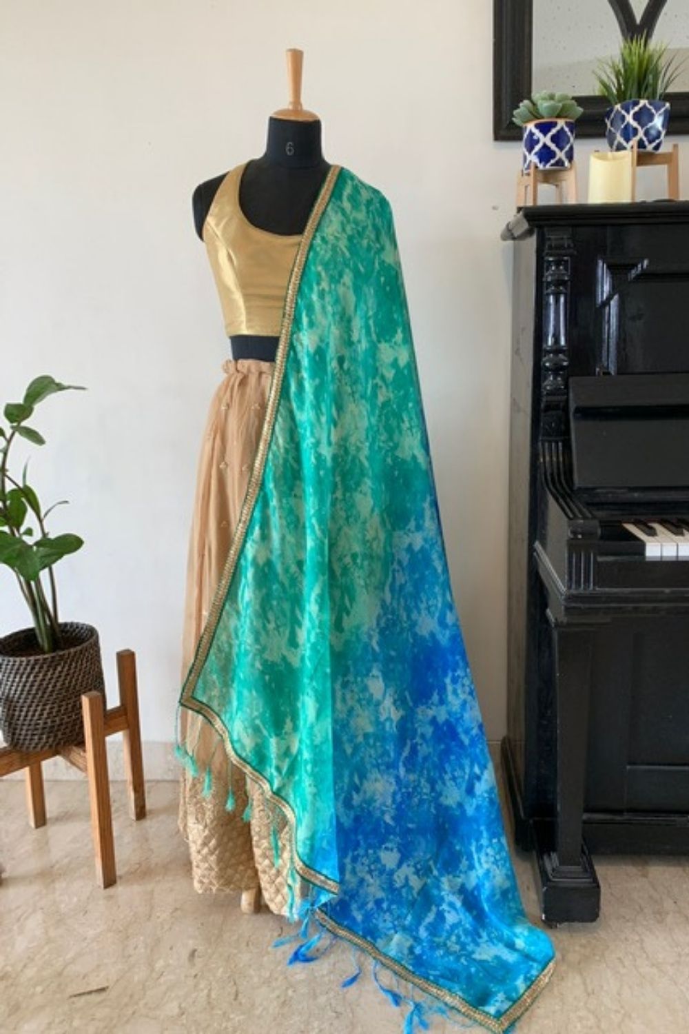 Blue and green shibori shaded Kota dupatta with green and gold sequin border