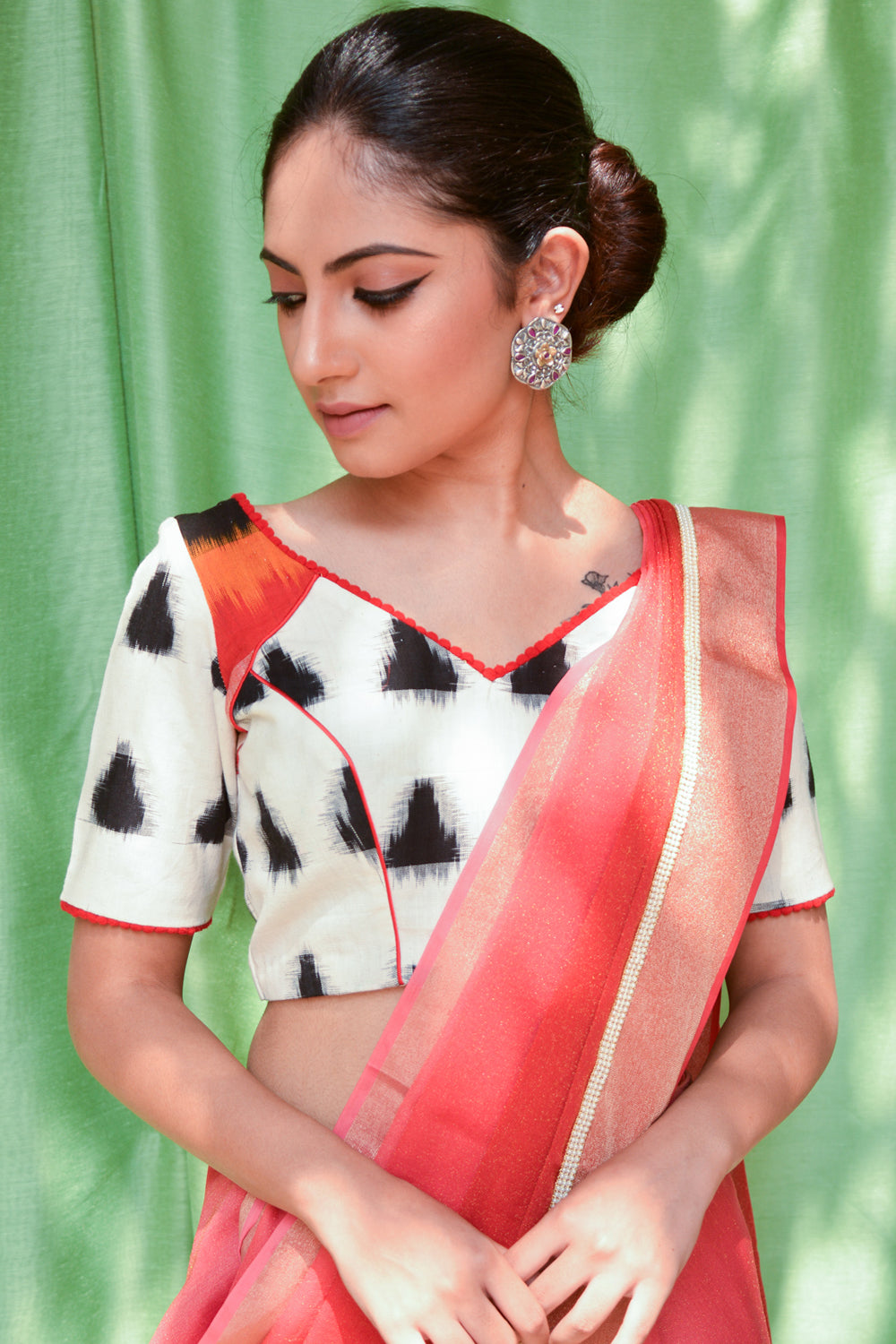 White and black Ikat cotton armband blouse with red pom pom detailing - House of Blouse