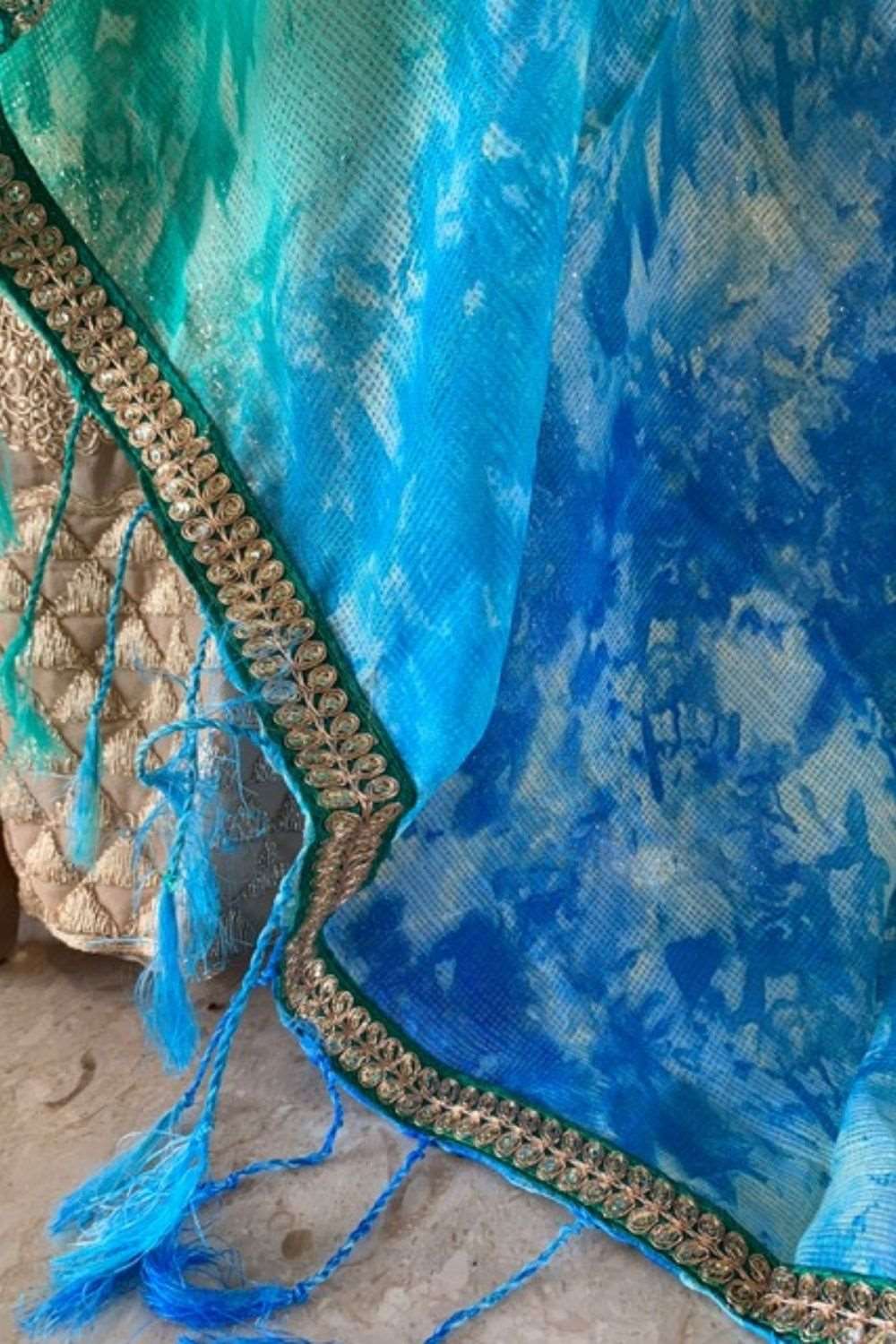 Blue and green shibori shaded Kota dupatta with green and gold sequin border