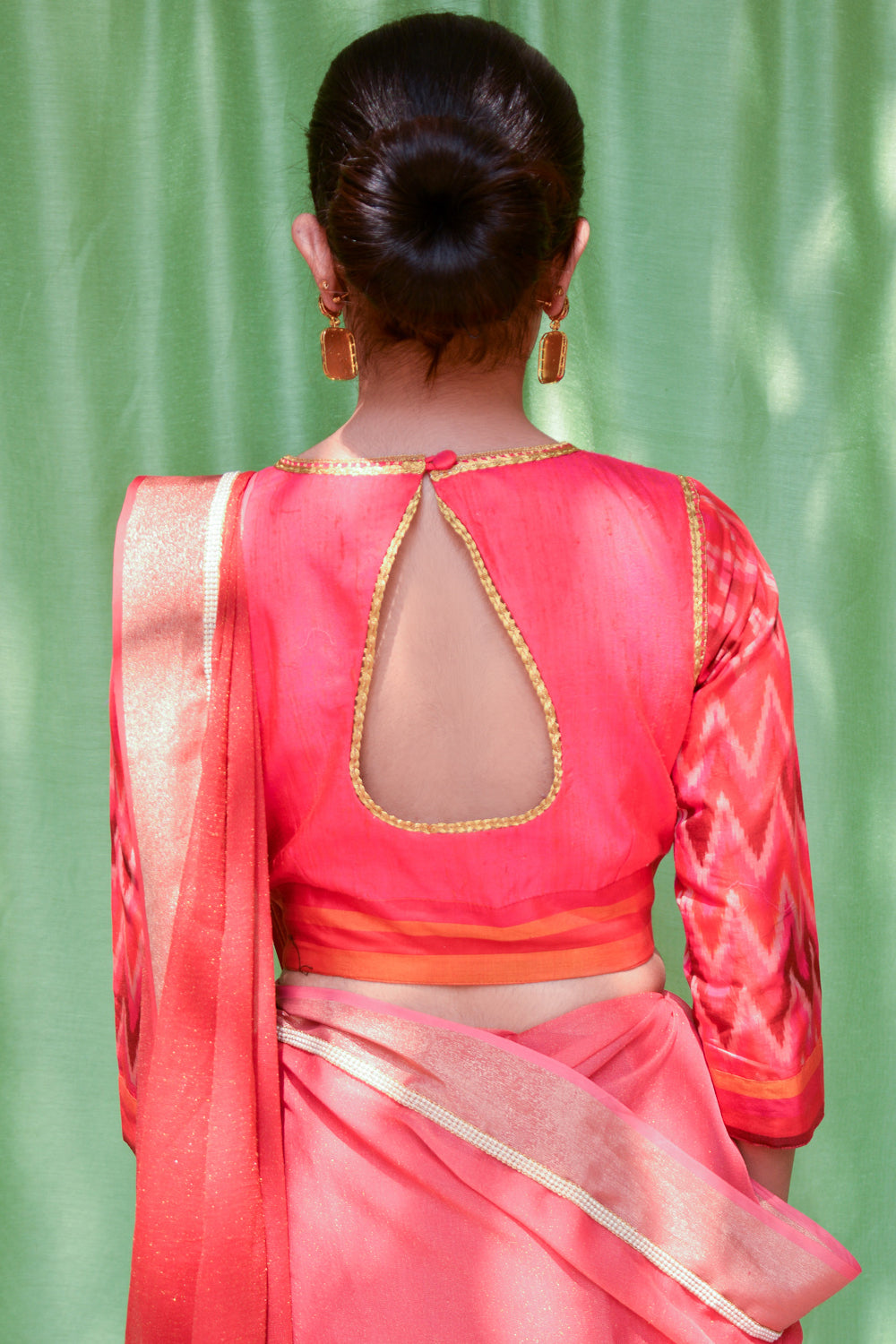 Reddish pink raw silk closed neck blouse with Ikat sleeves - House of Blouse
