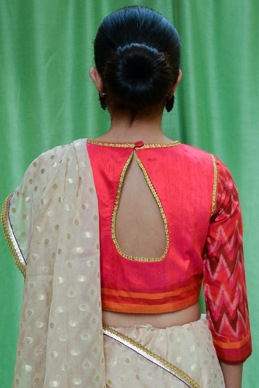 Reddish pink raw silk closed neck blouse with Ikat sleeves - House of Blouse