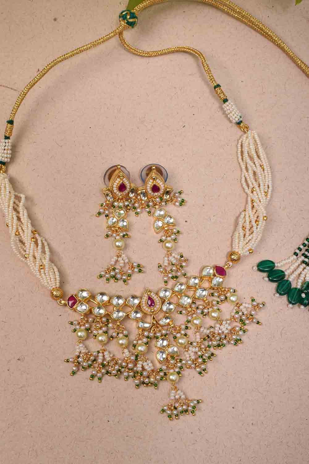 Ahmedabadi kundan multistrand necklace set with dangling pearl clusters