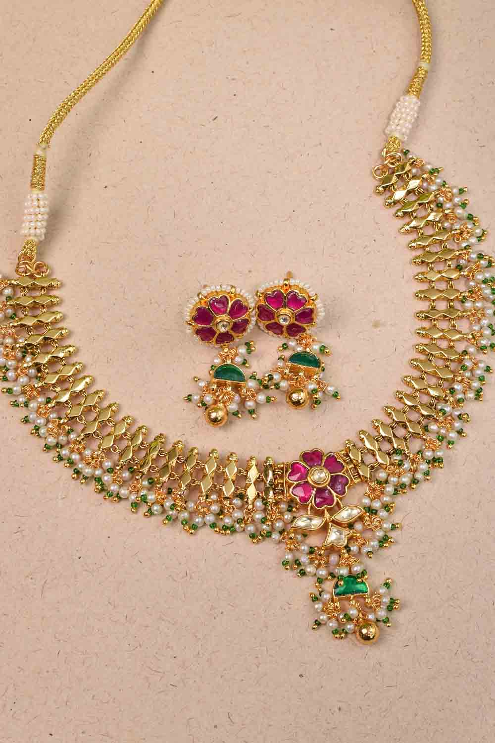Microplated Gold Tone Flexible Design Necklace Set with Floral Jadau center and dangling beads