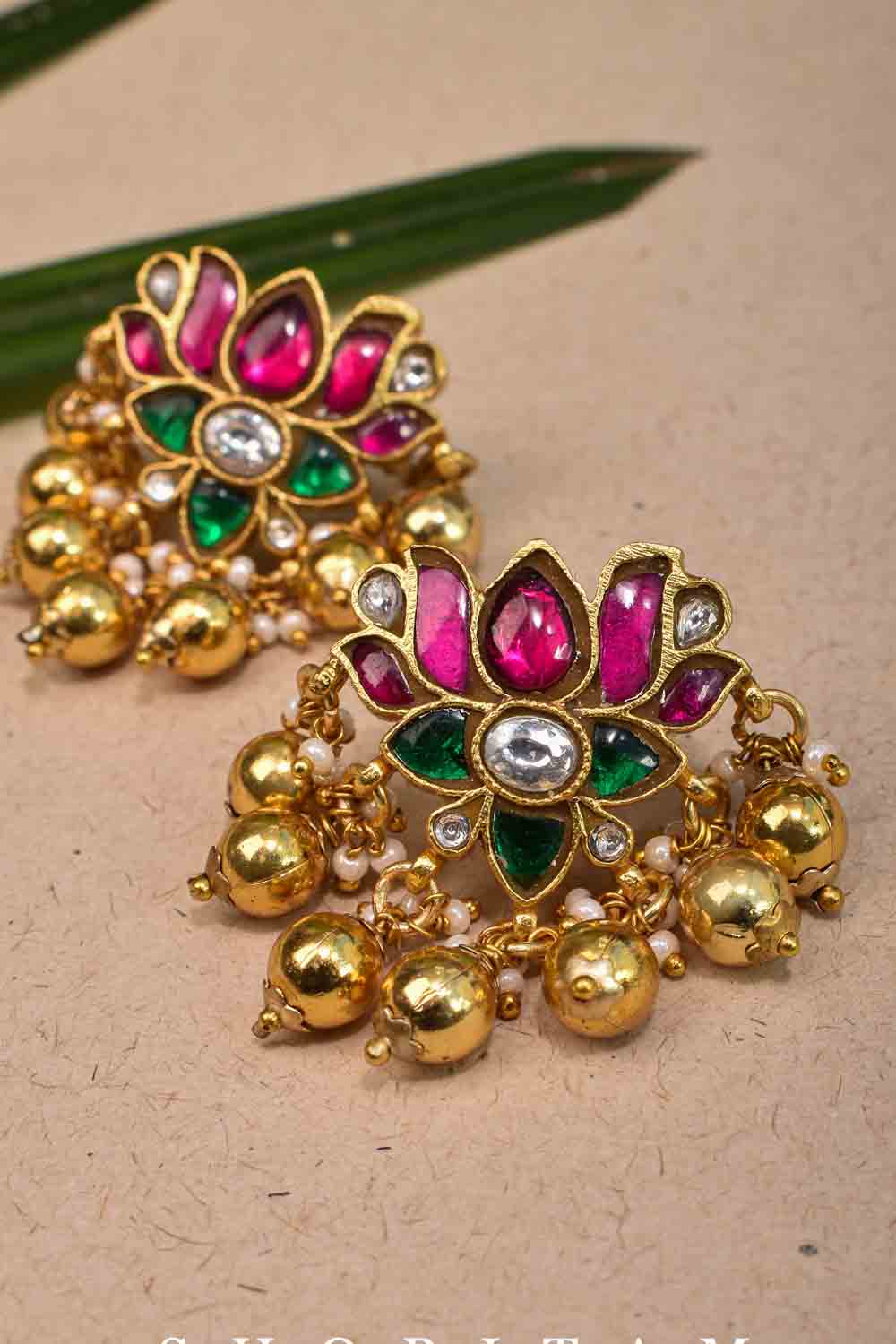 Jadau Blooming Lotus Earrings with translucent stones and dangling beads