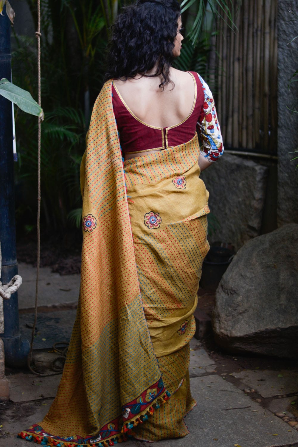 Mustard multicolour back stitch handwoven linen saree with floral kalamkari applique
