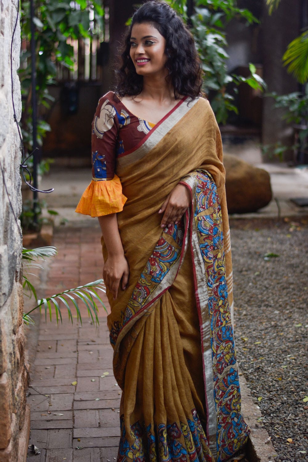 Brown Handwoven linen saree with silver border and Kalamkari applique