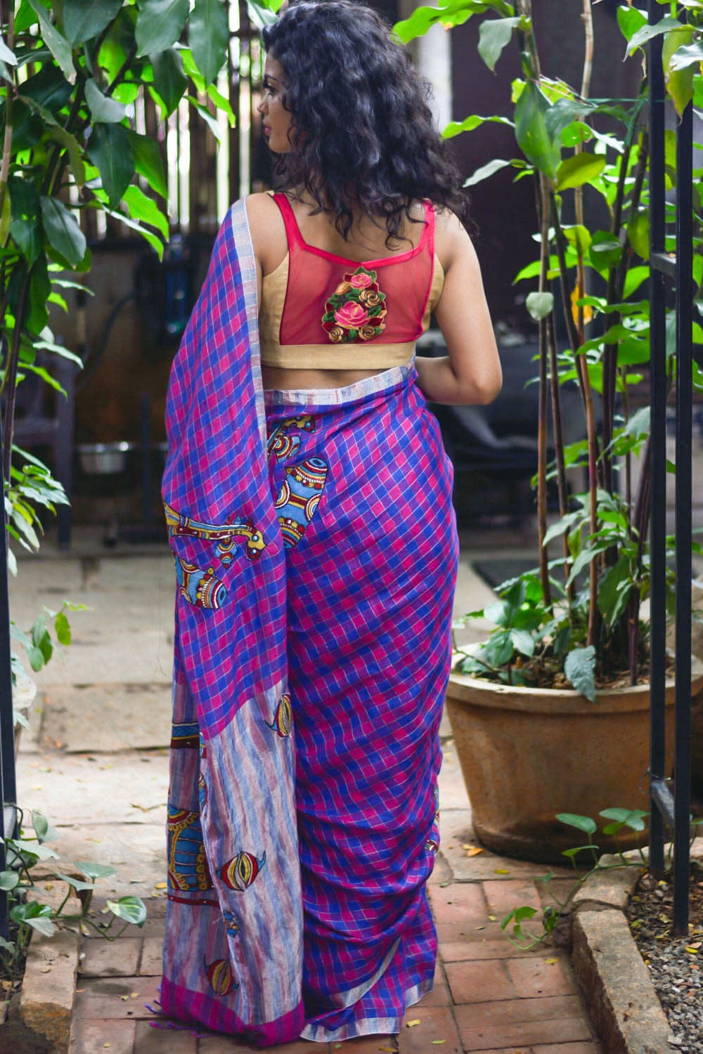 Pink blue checked handwoven linen saree with musical instruments kalamkari applique