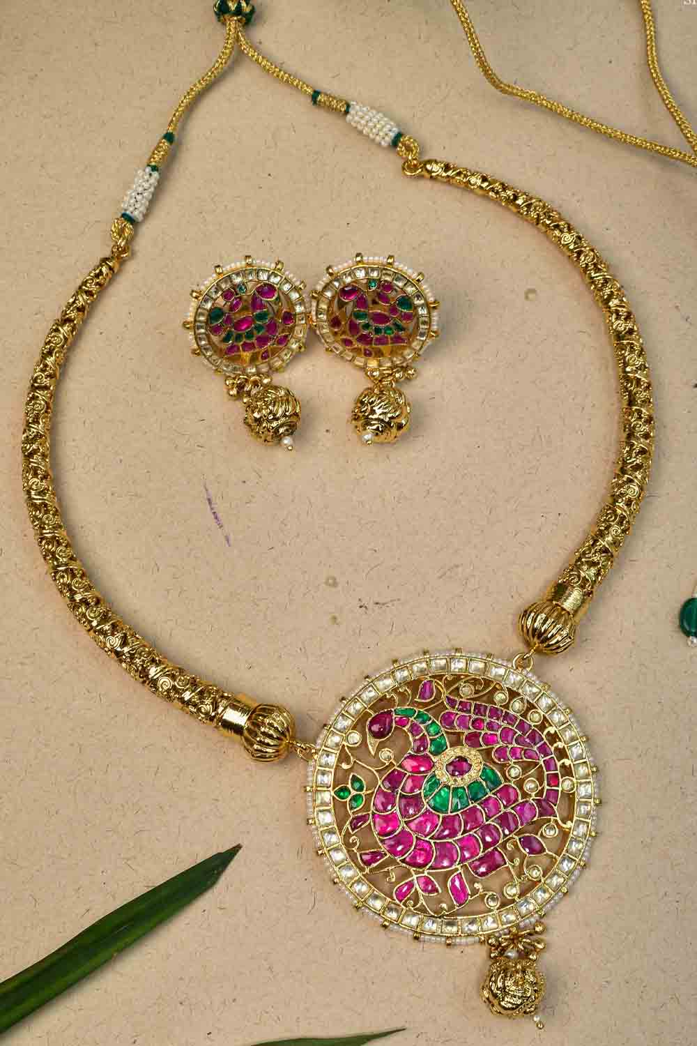 Distinct gold tone hasli with Prominent Kemp Peacock in Mandala Pendant Necklace Set