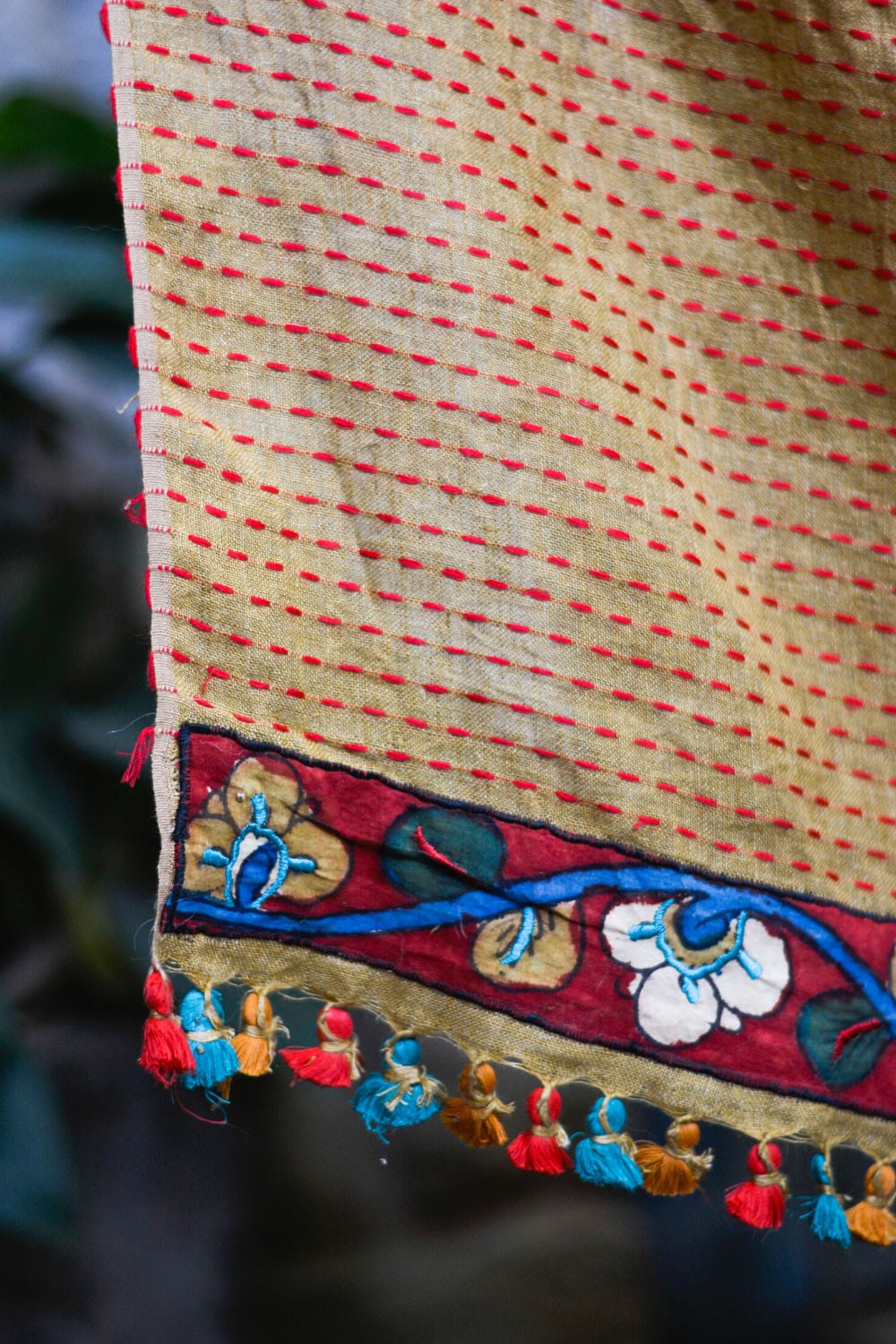 Mustard multicolour back stitch handwoven linen saree with floral kalamkari applique