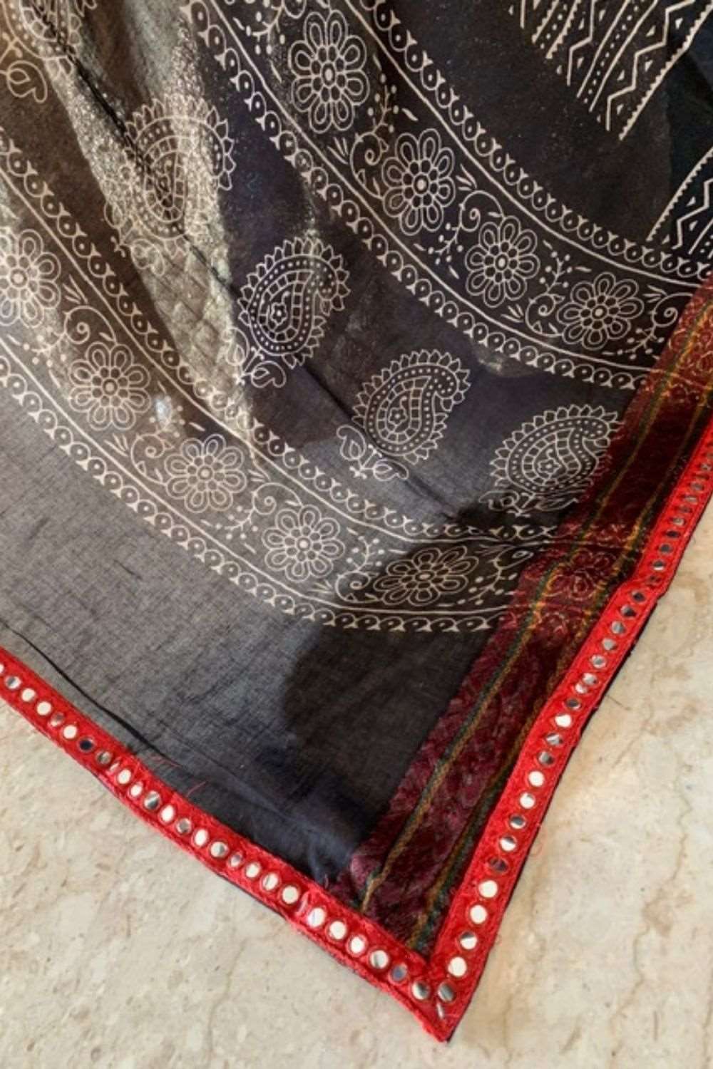 Black screen printed cotton dupatta with maroon mirrorwork border