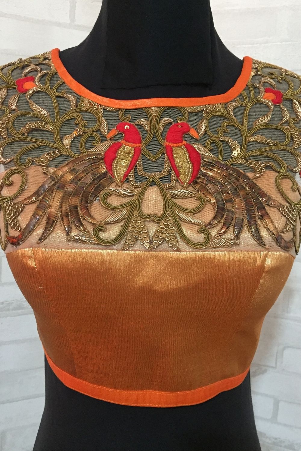 Orange tissue sleeveless blouse with embellished yoke and tie back - House of Blouse