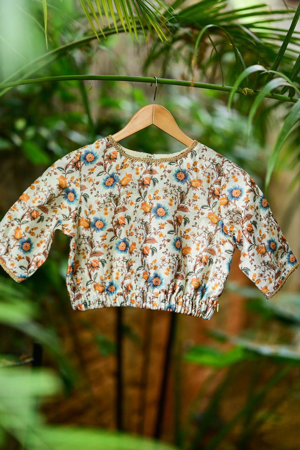 Light goldenrod floral pure rawsilk closed neck blouse with elastic waist