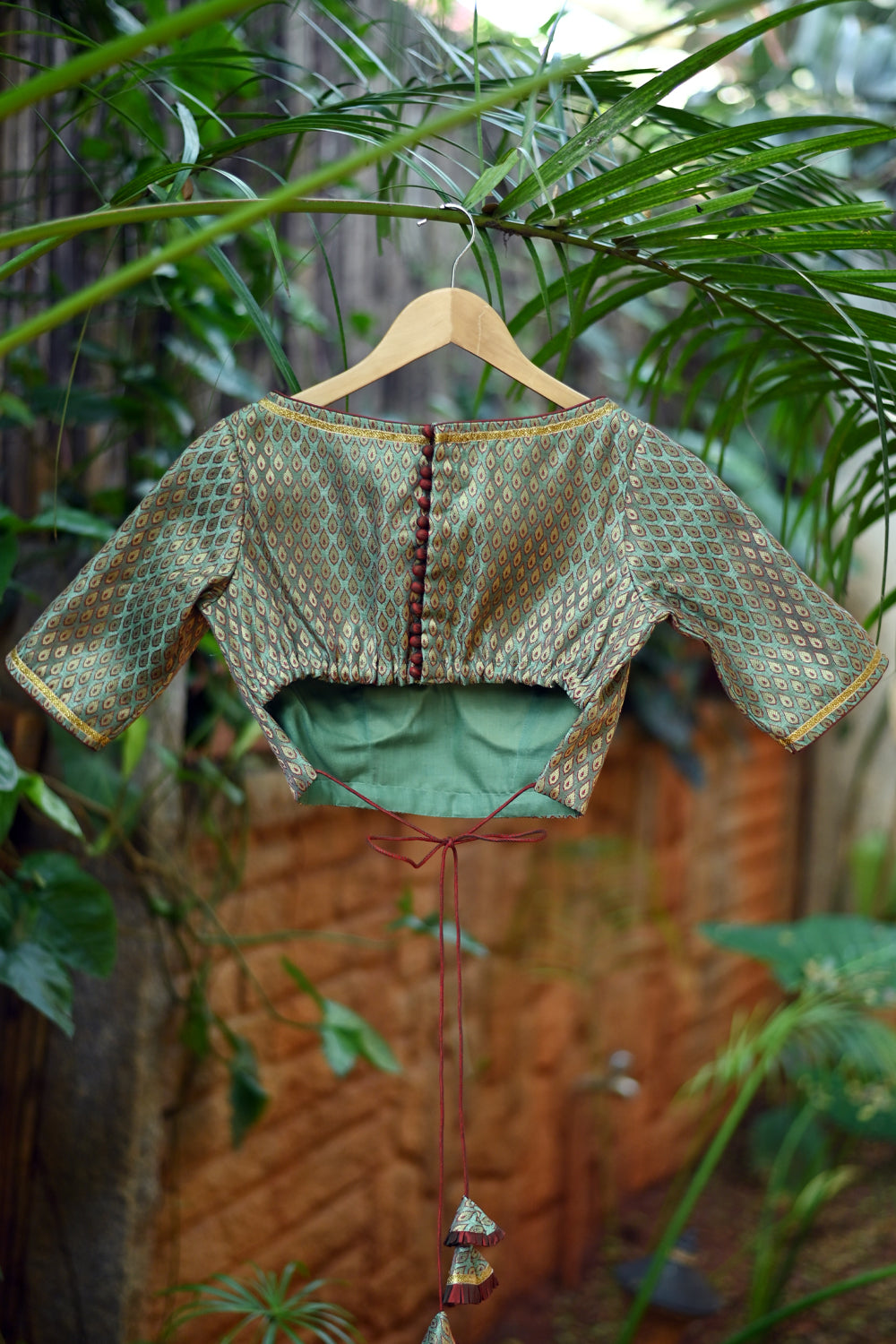 Pistachio green brocade boatneck blouse