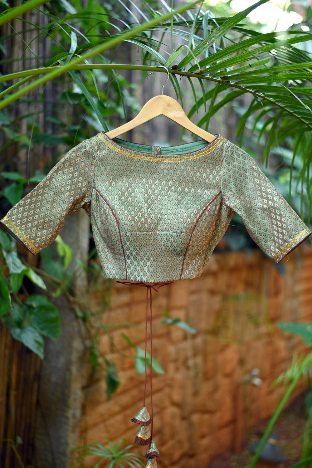 Pistachio green brocade boatneck blouse
