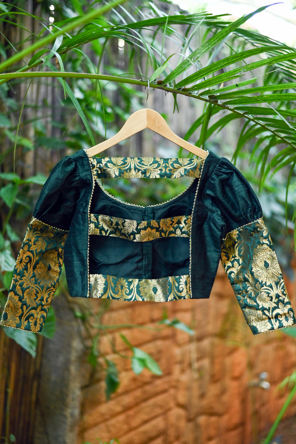 Sacramento green rawsilk U neck blouse with brocade sleeve detailing