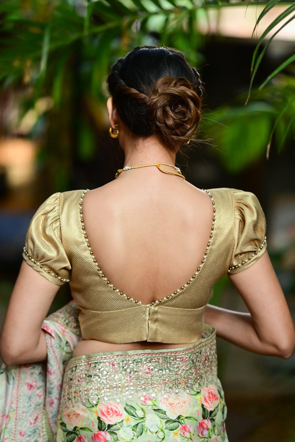 Gold brocade V neck blouse with puff sleeves with beads detailing.