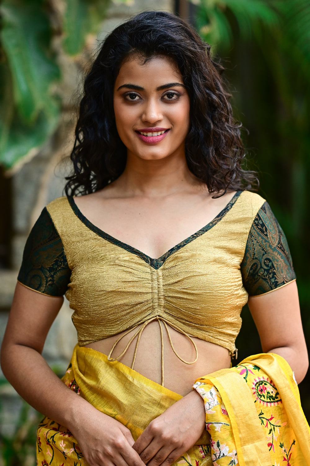 Ruched V neck blouse in crushed gold with dark green brocade sleeves