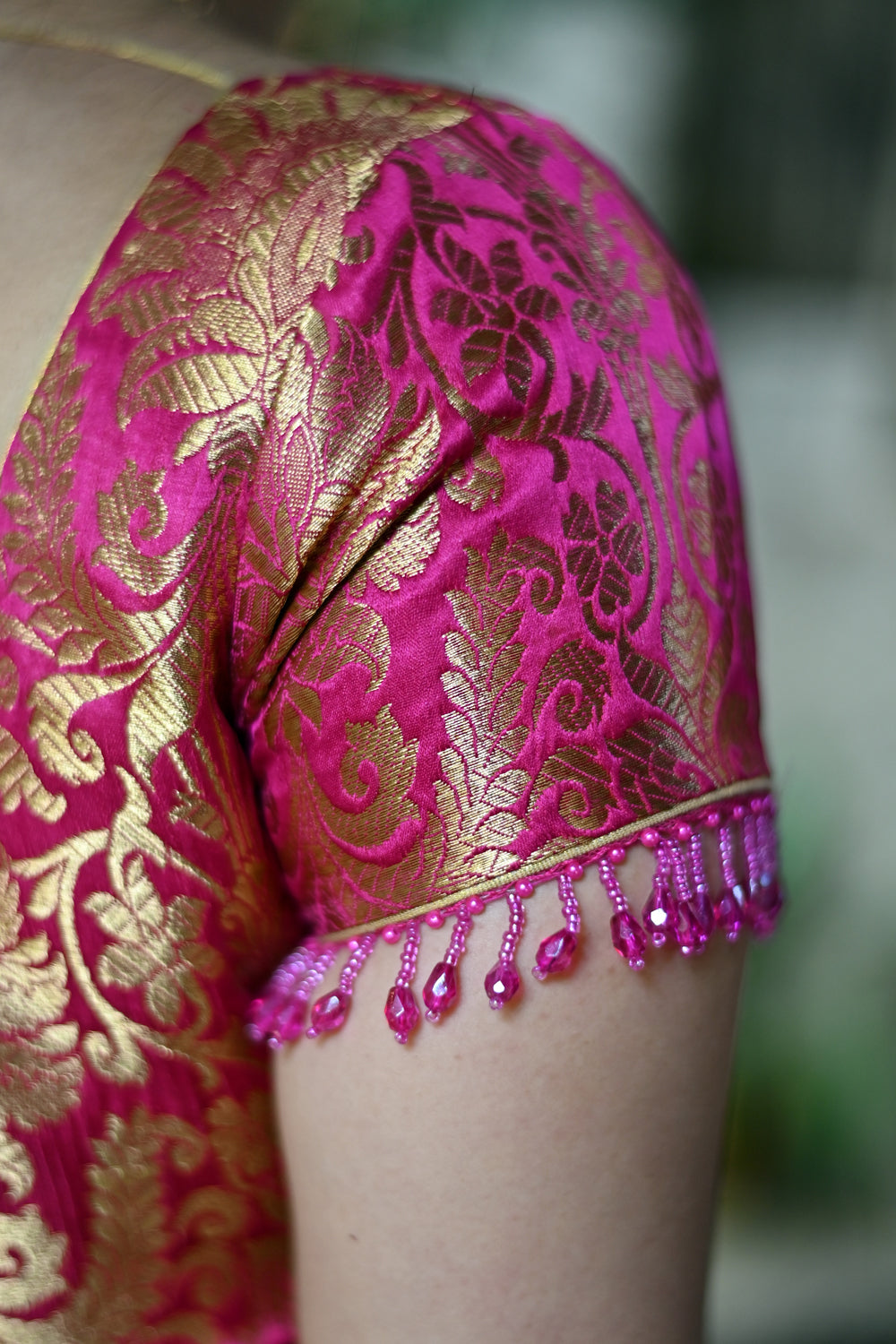 Rani Pink Banarasi Brocade Blouse with Back tie design and dangling beads