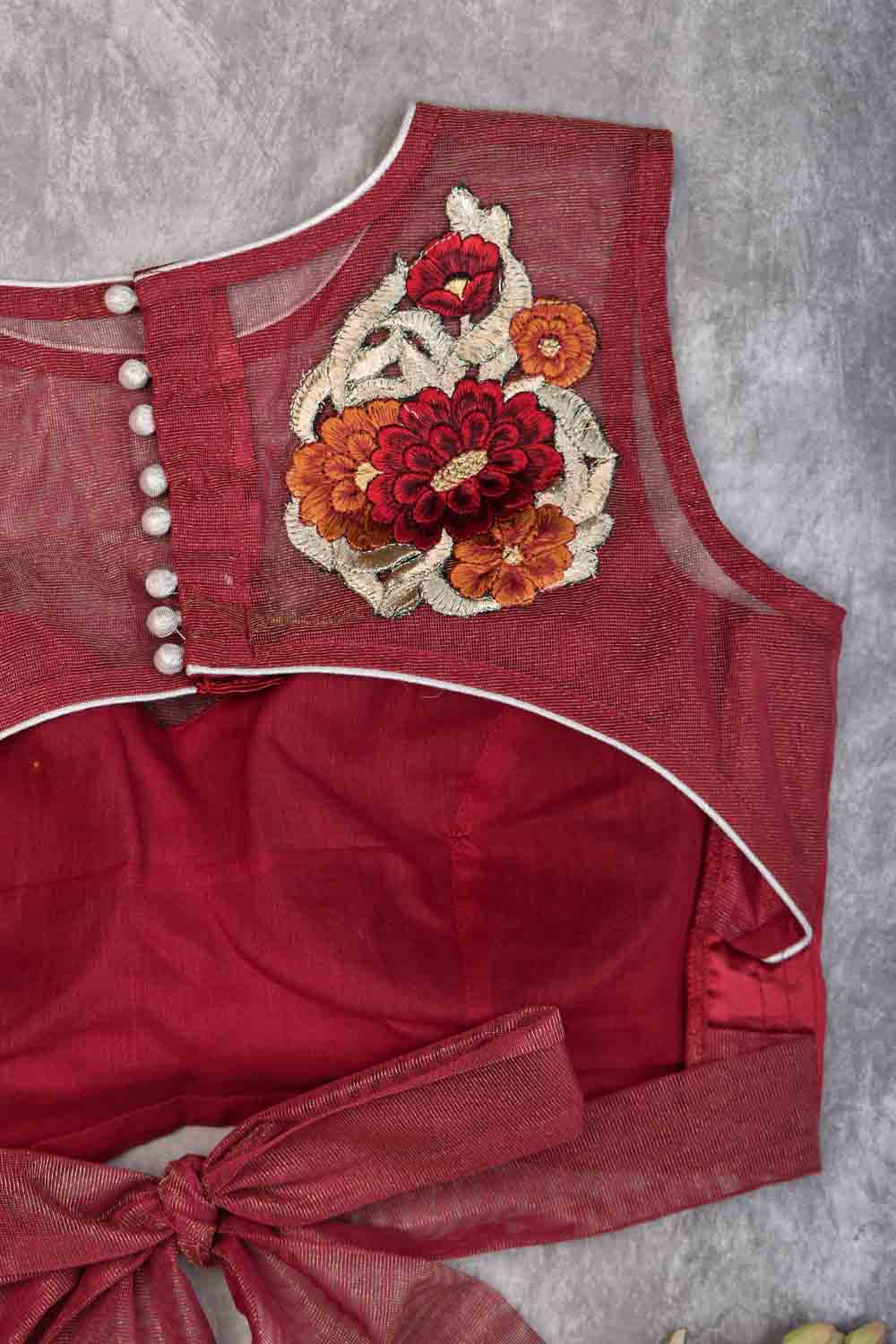 Deep red satin close neck  blouse with Applique detailing