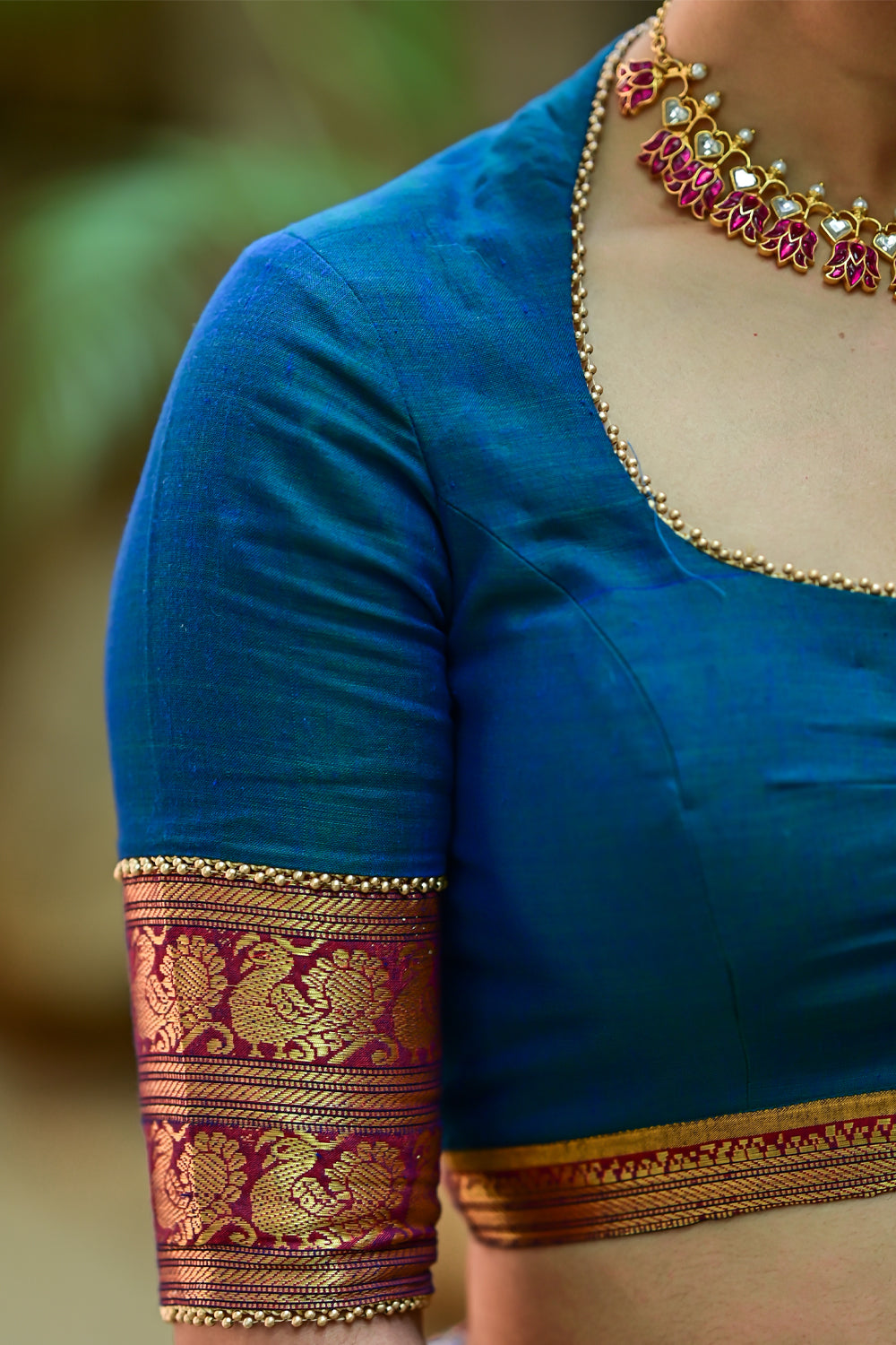 Blue sapphire pot neck blouse in Narayanpet cotton
