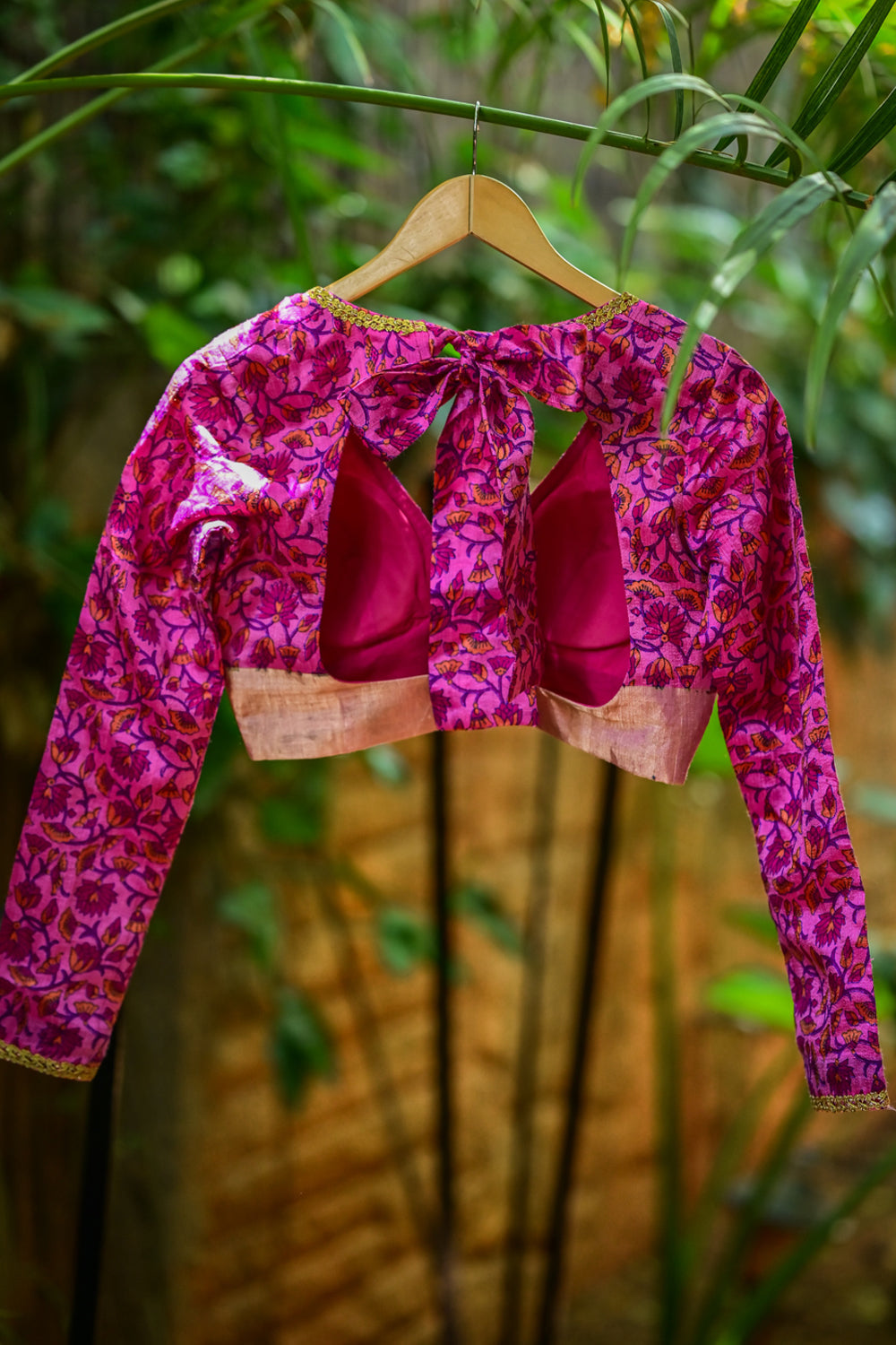 Hot pink floral pure rawsilk full sleeve V neck blouse with lace detailing