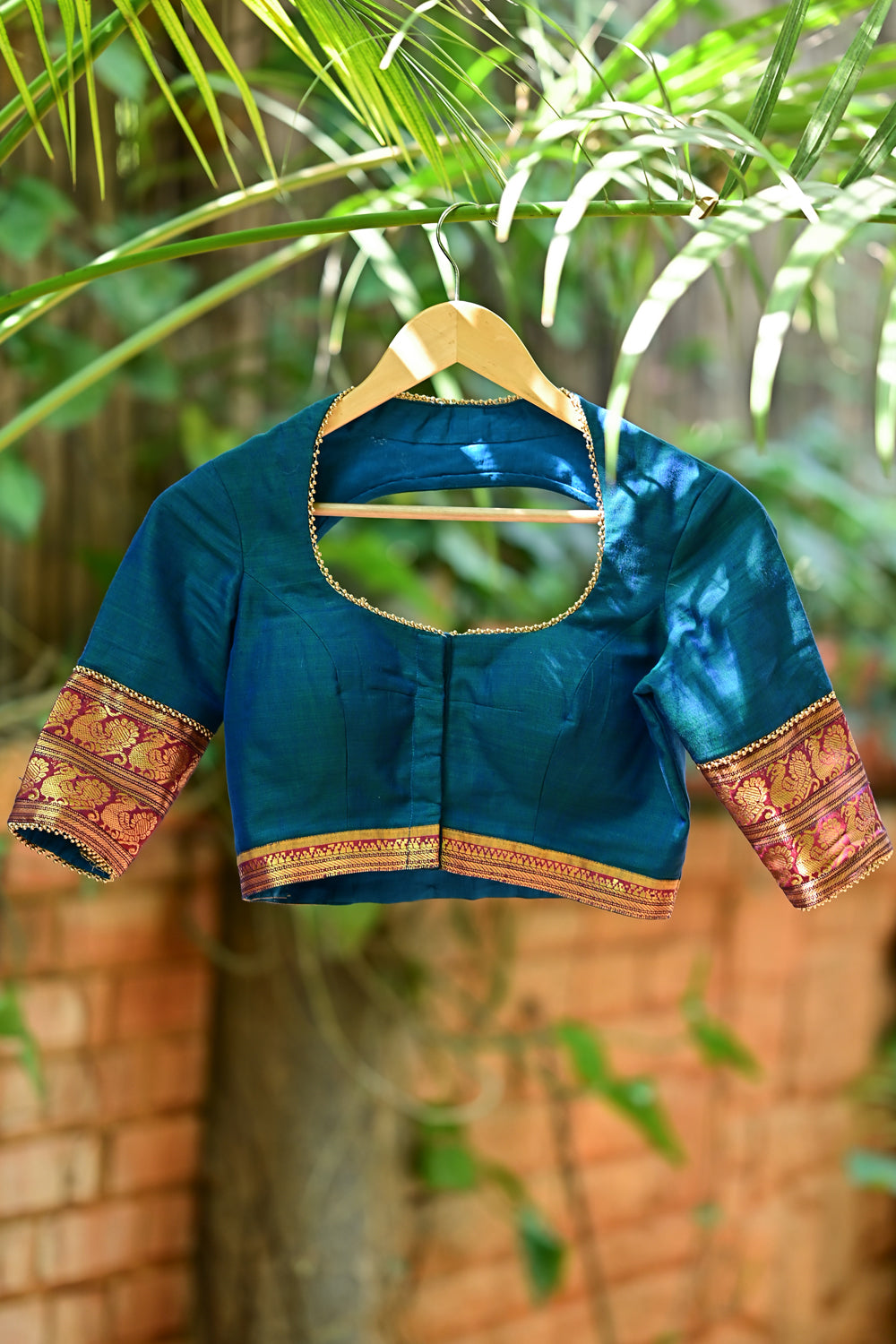 Blue sapphire pot neck blouse in Narayanpet cotton