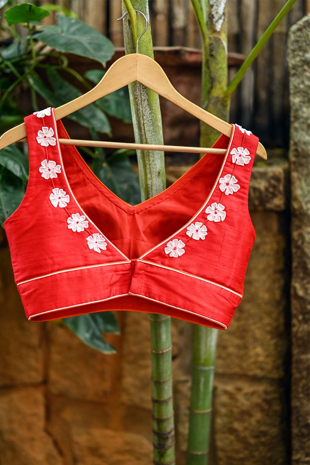 Red raw silk V neck blouse with  hand painted and embroidered parijatham Poovu