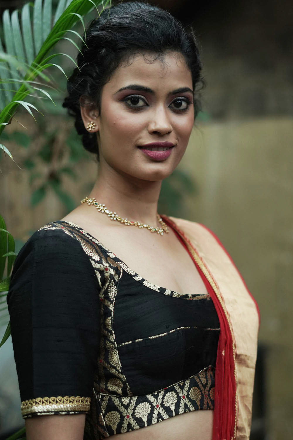 Black raw silk U neck blouse with black and gold brocade band