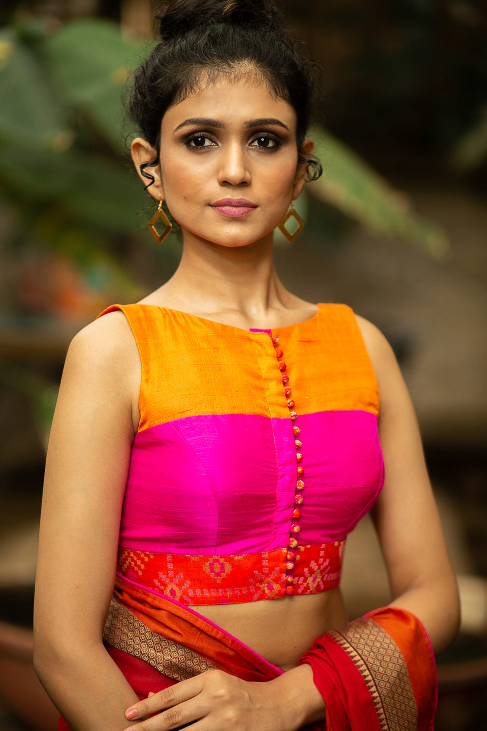 Orange and pink colour block raw silk sleeveless blouse with brocade border - House of Blouse