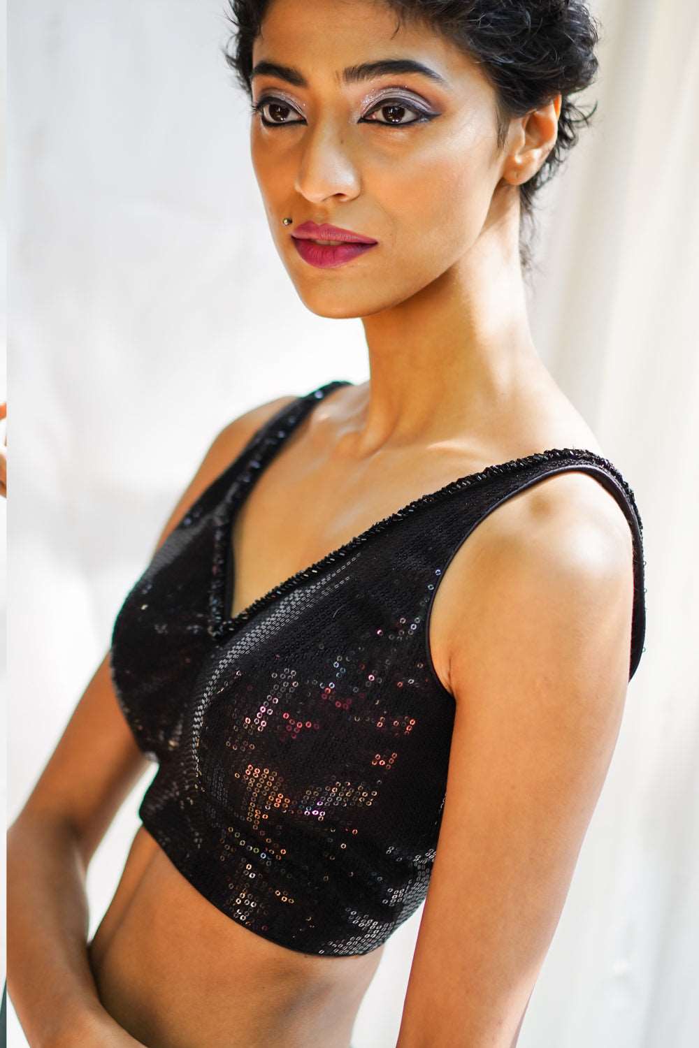 Black sequin V neck sleeveless blouse with beads detailing. - House of Blouse
