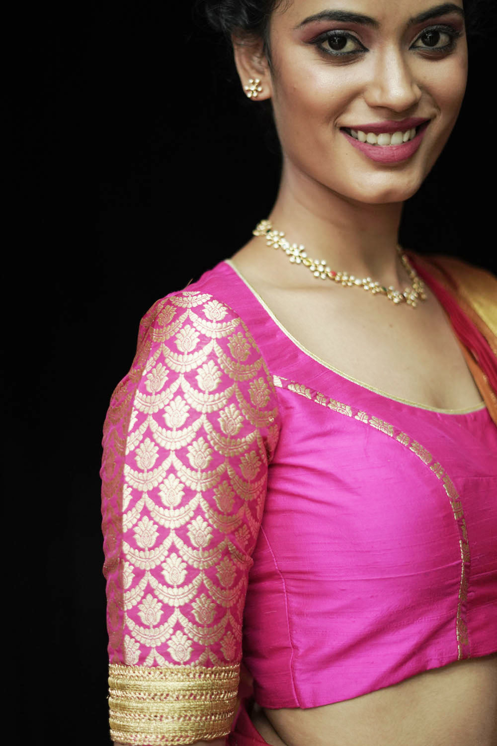 Fuchsia pink raw silk U neck blouse with  banarasi brocade sleeves