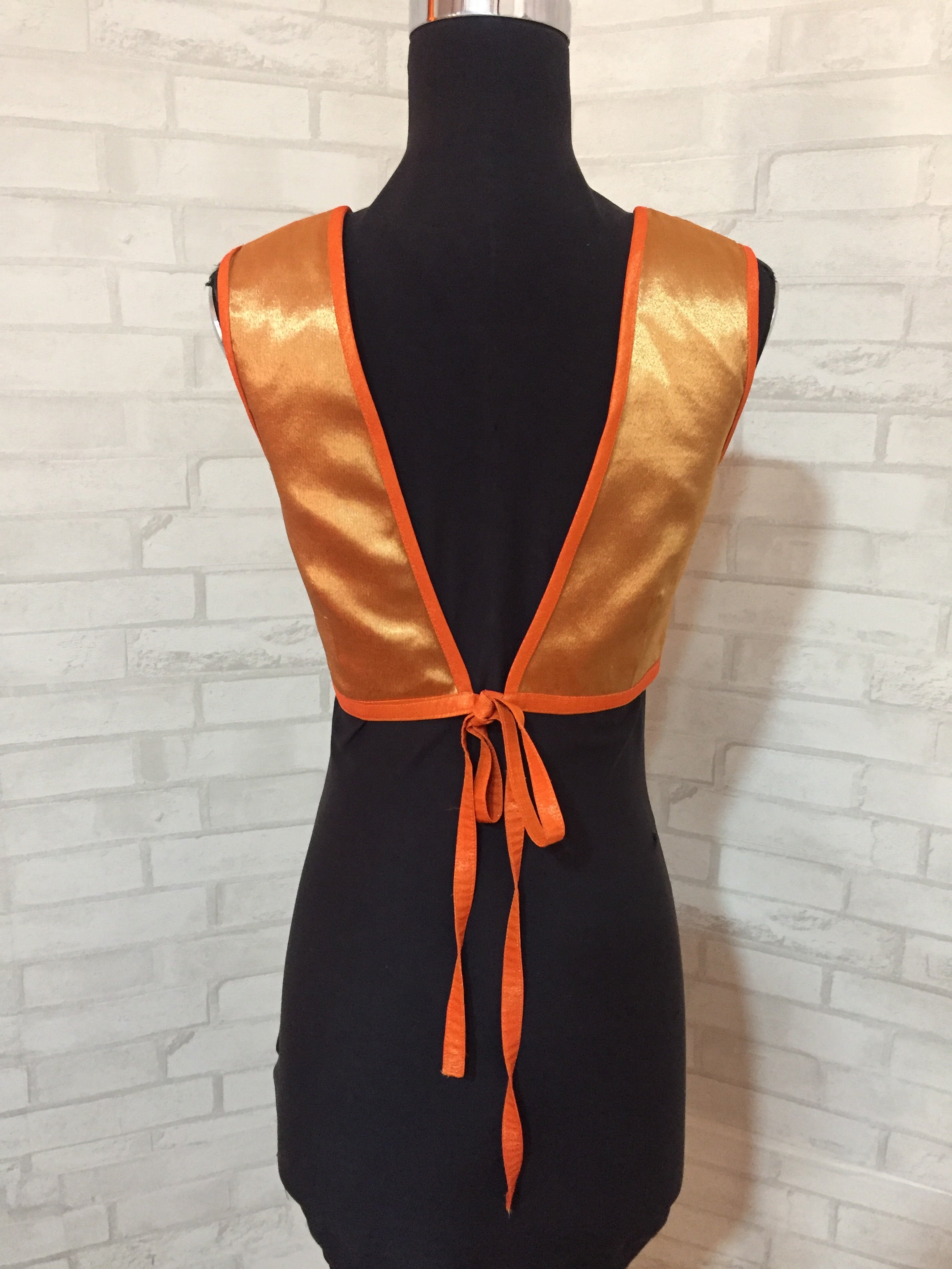 Orange tissue sleeveless blouse with embellished yoke and tie back - House of Blouse