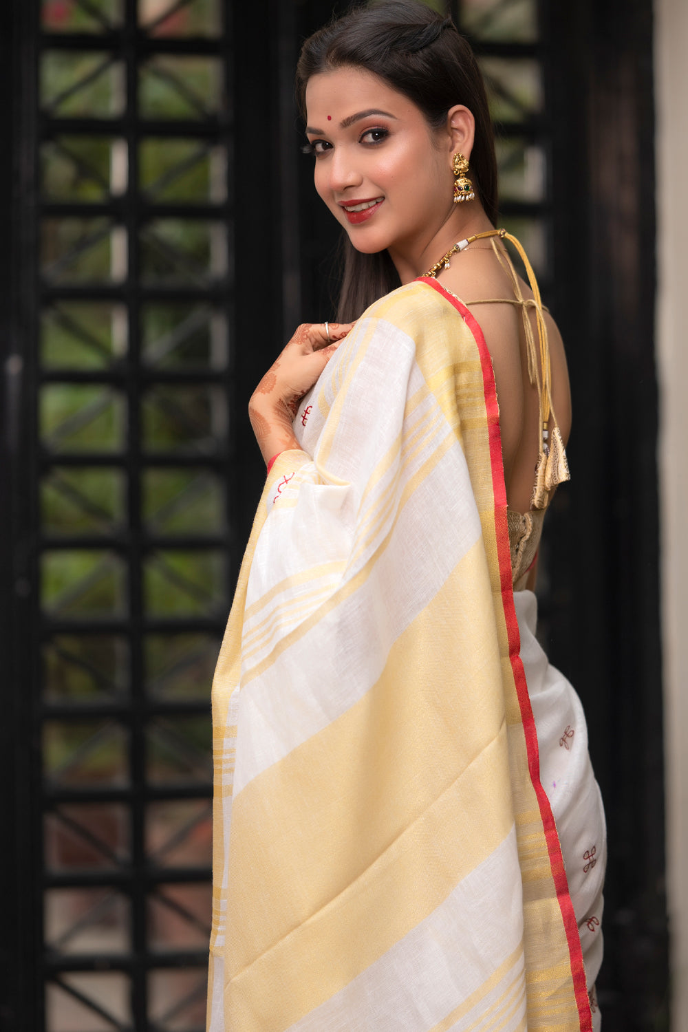 Rangoli Embroidered Border on Pure Linen Saree in White, Red and Gold