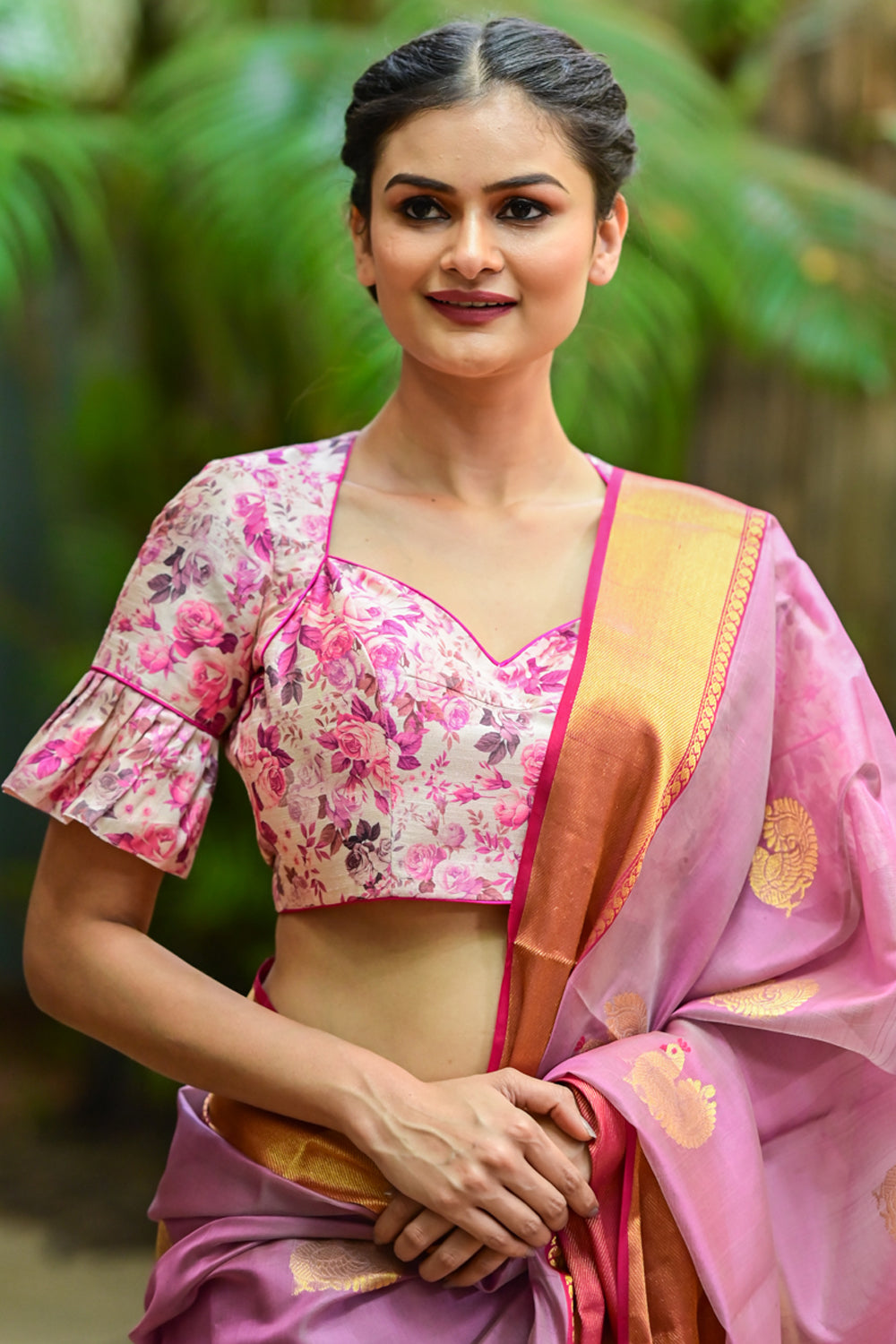 Light pink floral  semi raw silk sweetheart neck blouse with ruffled sleeves.