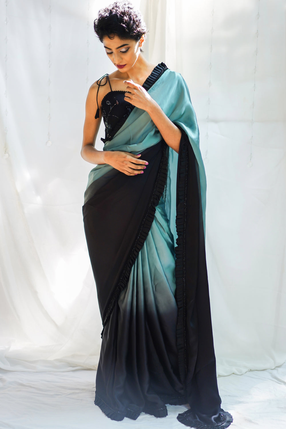 Black and greyish blue shaded pure satin saree with frills and black beads border - House of Blouse